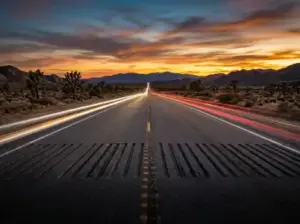 a straight asphalt desert highway